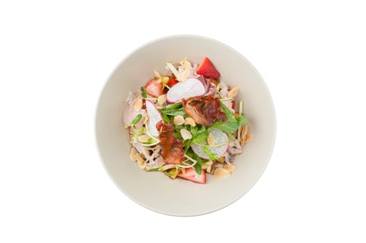 Vegetables and fruits salad with balsamic vinegar and navel orange dressing and smoked striploin ham 1.5 millimeters thickness in ceramic bowl isolated on white background with clipping path