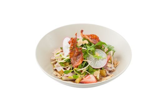 Vegetables and fruits salad with balsamic vinegar and navel orange dressing and smoked striploin ham 1.5 millimeters thickness in ceramic bowl isolated on white background with clipping path
