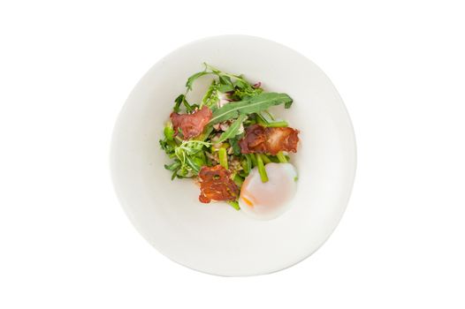 Vegetables salad with balsamic vinegar dressing, onsen tamago (Japanese style scald egg) and smoked striploin ham 1.5 millimeters thickness in ceramic bowl, a modern cusine concept food