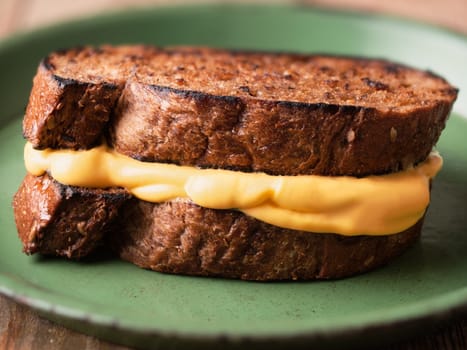 close up of a rustic cheese sandwich