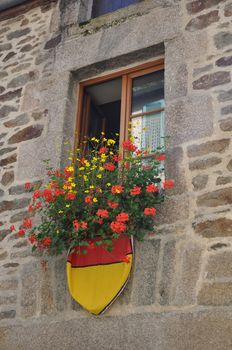 Medieval half-timbered buildings in the ancient french town of Dinan in Brittany. This old house is in the Rue de Jerzual, which leads into the Rue du Petit Port and then to the River Rance.