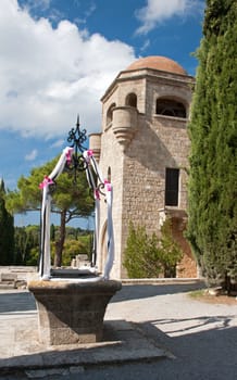 Church of our Lady, and decorated well, at Ialyssos monastery on the Greek island of Rhodes is built at the top of Mount Filerimos