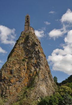 The Chapel built on the top of a needle of volcanic lava, called Rocher St Michel ( Mont d'Aiguilhe ) in the city of Le Puy en Velay, is one of the most impressive sights in the Auvergne, France