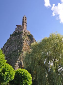 The Chapel built on the top of a needle of volcanic lava, called Rocher St Michel ( Mont d'Aiguilhe ) is one of the most impressive sights in the Auvergne, France