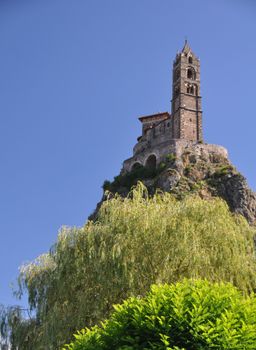 The Chapel built on the top of a needle of volcanic lava, called Rocher St Michel ( Mont d'Aiguilhe ) is one of the most impressive sights in the Auvergne, France