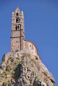 The Chapel built on the top of a needle of volcanic lava, called Rocher St Michel ( Mont d'Aiguilhe ) is one of the most impressive sights in the Auvergne, France