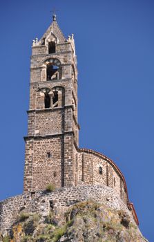 The Chapel built on the top of a needle of volcanic lava, called Rocher St Michel ( Mont d'Aiguilhe ) is one of the most impressive sights in the Auvergne, France