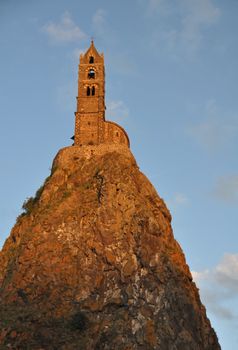 The Chapel built on the top of a needle of volcanic lava, called Rocher St Michel ( Mont d'Aiguilhe ) is one of the most impressive sights in the Auvergne, France