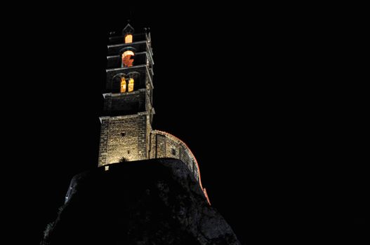 The Chapel built on the top of a needle of volcanic lava, called Rocher St Michel ( Mont d'Aiguilhe ) is one of the most impressive sights in the Auvergne, France