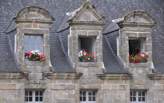 Floral display in the village of Locronan, in Brittany, rural France