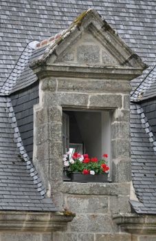 Floral display in the village of Locronan, in Brittany, rural France