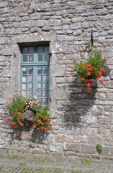 Floral display in the village of Locronan, in Brittany, rural France