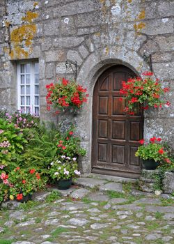 Floral display in the village of Locronan, in Brittany, rural France