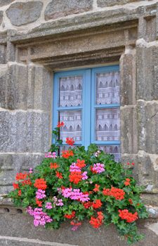 Floral display in the village of Locronan, in Brittany, rural France