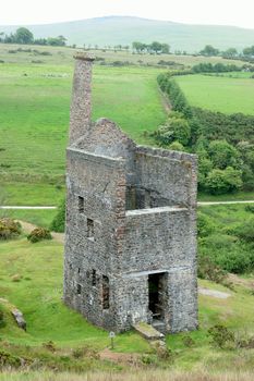 Images of old and non operating mines and their buildings .