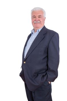 Single handsome grinning senior adult male with mustache and blue blazer with hands in pockets