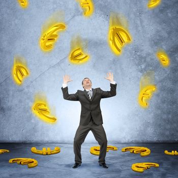 Businessman under euro sign rain on grey background