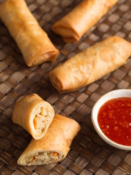 close up of rustic golden chinese spring rolls