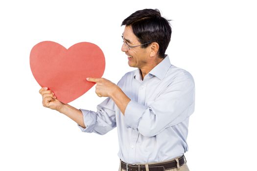 Older asian man showing a heart on white background