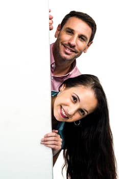 Smiling couple posing for camera on white screen