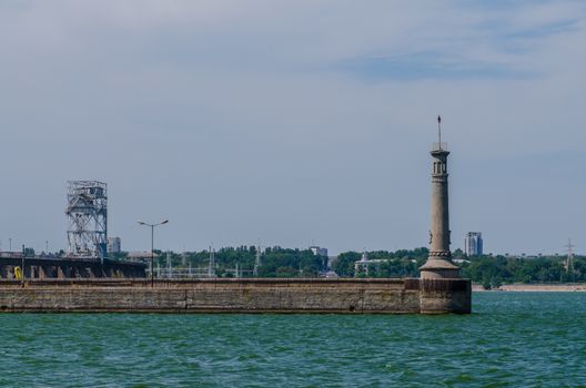 river lighthouse on the gateway through the cascade of hydroelectric power