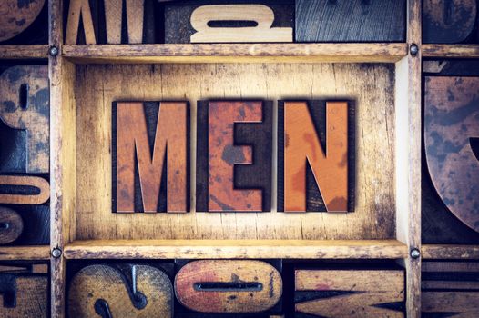 The word "Men" written in vintage wooden letterpress type.