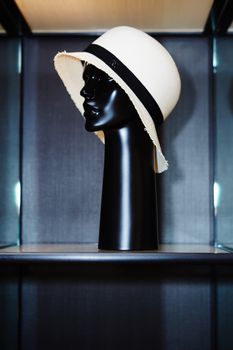 Head a dummy in a hat at boutique