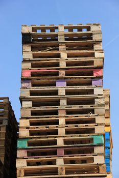 Stacked wooden pallets at a pallet storage