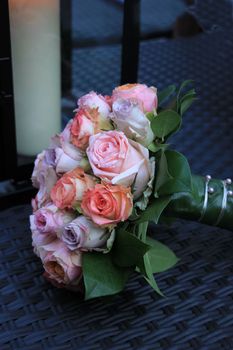 Pastel roses in a bridal bouquet