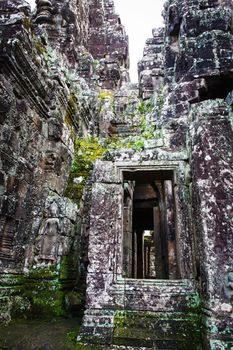 Angkor Wat Cambodia. Khmer ancient Buddhist temple under the picturesque sky with clouds and sunlight. Famous landmark, place of worship in Asia.