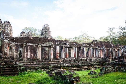 Angkor Wat Cambodia. Khmer ancient Buddhist temple under the picturesque sky with clouds and sunlight. Famous landmark, place of worship in Asia.