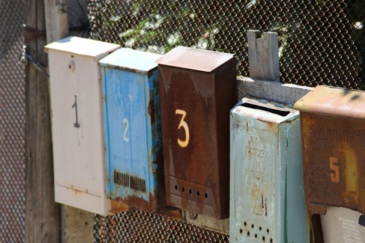 old postbox on the fence on the outdoors