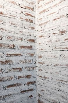 Corner of white brick wall