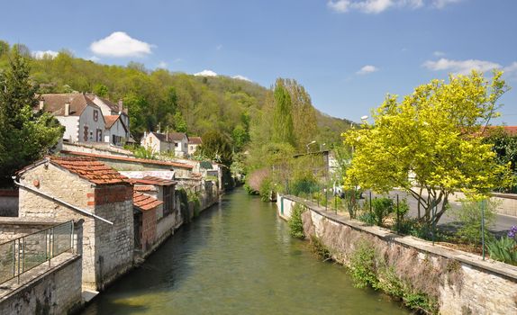 Tonnerre in the Morvan, Burgundy, France sits on the River Armancon. Famed for theTonnerre Fosse Dionne wash house