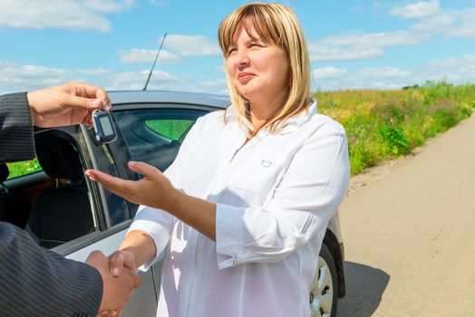 female 50 years, bought a new car and get key