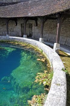 Tonnerre in the Morvan, Burgundy, France sits on the River Armancon. Famed for theTonnerre Fosse Dionne wash house