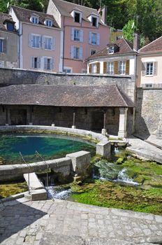 Tonnerre in Burgundy France sits on the River Armancon, famed for its Tonnerre Fosse Dionne wash house