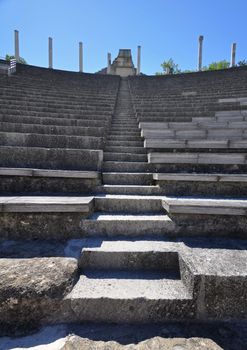 The extensive Roman ruins at Vaison-La-Romaine, Provence, France. These Gallo-Roman remains are situated in the very centre of the fascinating ancient town of Vaison-La-Romaine. The ruins shown are within the Quartier De Puymin ( Puymin Hill ). The Roman Theatre shown seated 6000 people and was built in the 1st Century. Part of the top gallery Portico remains and is shown.