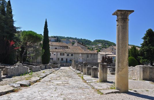 La Villasse, these extensive Roman ruins are at Vaison-La-Romaine, Provence, France. These Gallo-Roman remains are situated in the very centre of the fascinating ancient town of Vaison-La-Romaine. The ruins shown are main street at Quartier de la Villasse. At the end of the street (which was a shopping street) at the left are the baths