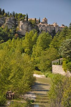 The ( Haute-Ville)  medieval city at Vaison La Romain, built on a cliff above the River Ouveze, in the Vancluse, Provence, France.