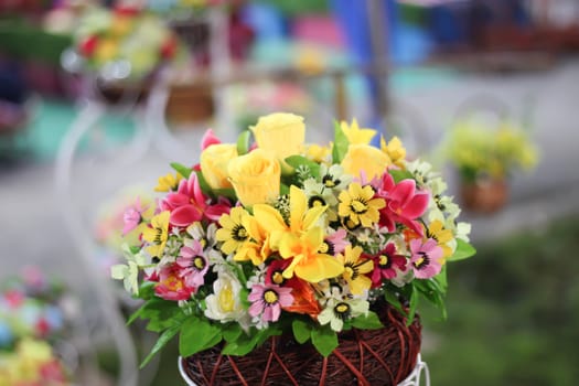 Bright and beautiful colors of plastic flowers.