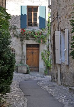 A small road in the old medieval village of Vaison-la-Romaine, in Provence, France. (taken in the Haute Ville)