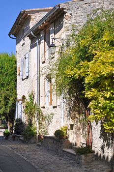 A cottage with shutters in a Vaison-la-Romaine, in Provence, France.
