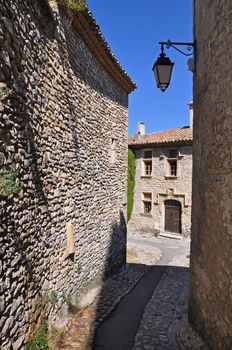 A small lane in the old medieval village of Vaison-la-Romaine, in Provence, France. (taken in the Haute Ville)