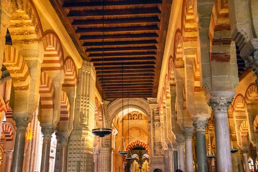 Capilla de Villaviciosa, First Chrstian Chapel, Arches Mezquita Cordoba Spain.  Mezquita Created in 785 as a Mosque. Capilla created 1371, Mezquita converted to a Cathedral in 1500. 