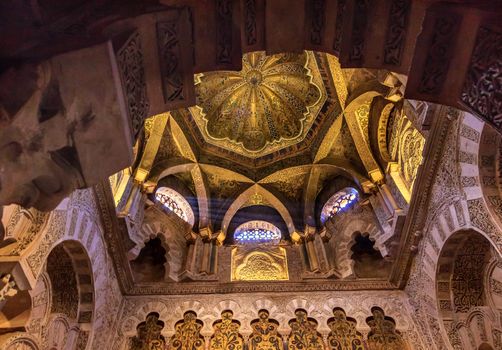 Mihrab Moslem Islam Prayer Niche Arches Mezquita Cordoba Spain.  Mezquita Created in 785 as a Mosque. Mezquita converted to a Cathedral in 1500. 