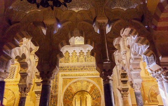 Mihrab Moslem Islam Prayer Niche Arches Mezquita Cordoba Spain.  Mezquita Created in 785 as a Mosque. Mezquita converted to a Cathedral in 1500. 