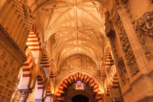 Arches Pillars Mezquita Cordoba Spain.  Created in 785 as a Mosque, was converted to a Cathedral in the 1500.  850 Columns and Arches  