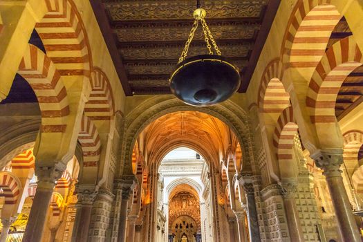 Capilla de Villaviciosa, First Chrstian Chapel, Arches Mezquita Cordoba Spain.  Mezquita Created in 785 as a Mosque. Capilla created 1371, Mezquita converted to a Cathedral in 1500. 