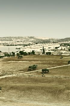 Spanish Landscape with Lake and City in the Autumn, Vintage Style Toned Picture